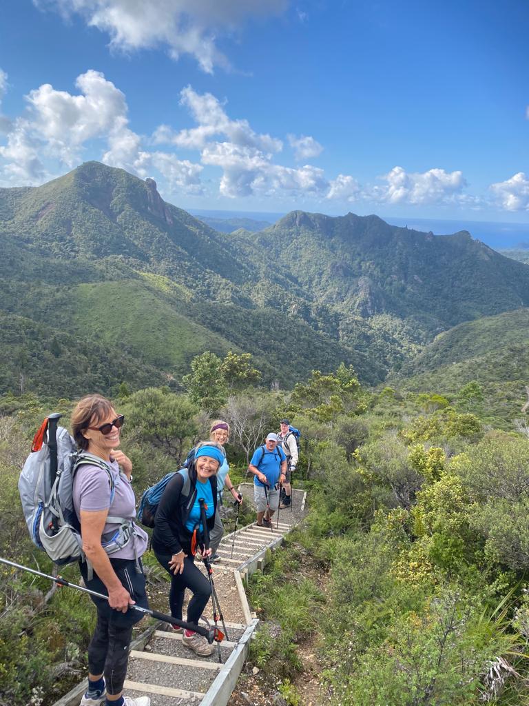 A group of walkers on a guided walk of Aotea / Great Barrier Island, an excellent New Zealand guided walking and hiking tour near Auckland