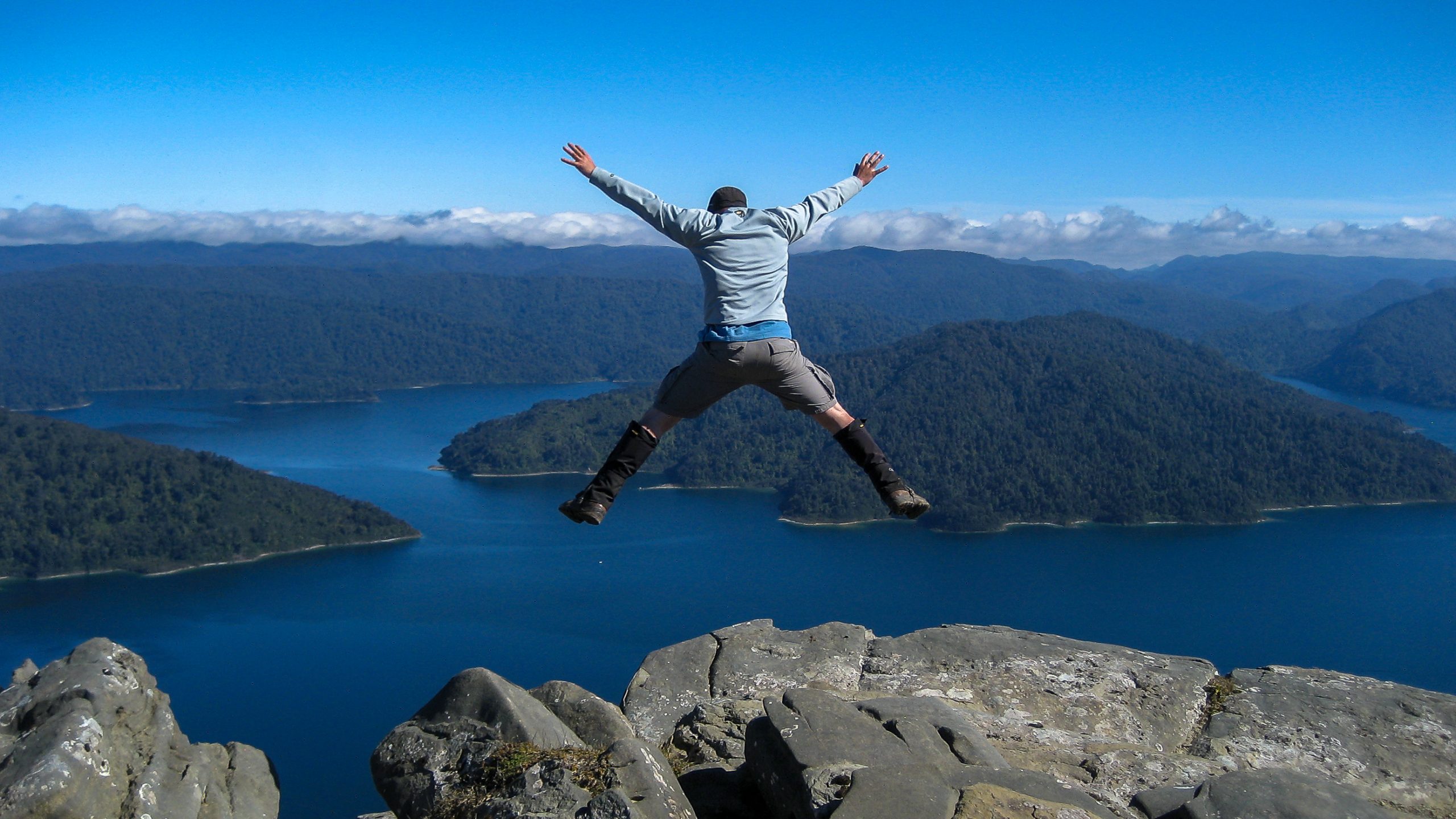 Hiker Jumping for Joy on Panekire Bluff