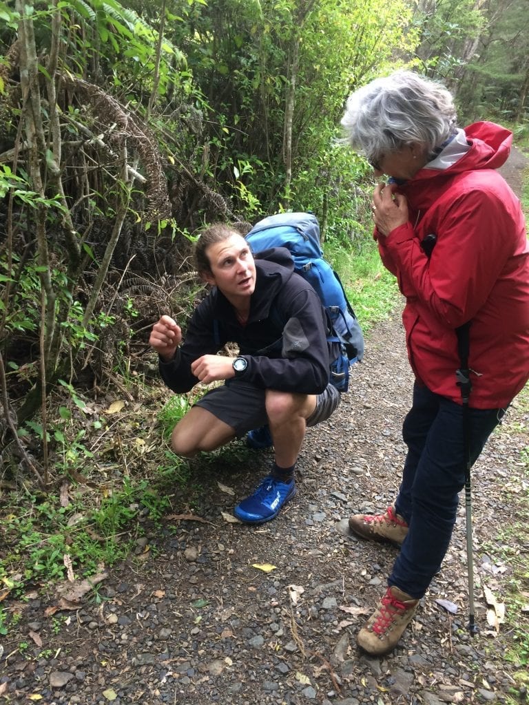Walking Legends guide showing guest native flora